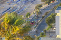 view from above to the promenade of akti kanari near monte smith in rhodes with the beach and the street