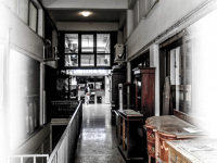 in a house passage in monastiraki in athens are standing antique wooden furniture for sale