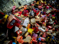 thousands of colorful padlocks are hanging at the hohenzollernbrücke in cologne