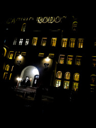 the casino rodos in rhodes city by night with yellow glowing windows