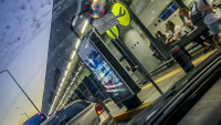 view through a windshield to the entrance of the airport rhodes at evening light
