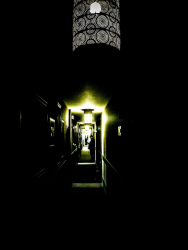 at the end of a dark corridor in the hotel esprit in bratislava you see lights of a lamp
