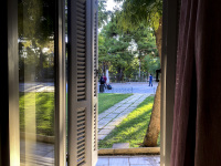 through a window of the hotel acropolis vision in athens you see the street early in the morning