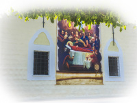 a holy mural between two windows at the churchwall of maria in ialysos on rhodes