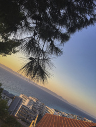 view from monte smith over the houses in ialysos, the sea and the sunset in rhodes