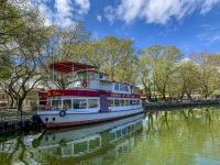 a ship for cruises in the lake pamvotida in ioannina is waiting on the shore