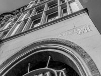 the building of the eau de cologne 4711 in the glockengasse in cologne, black-and-white