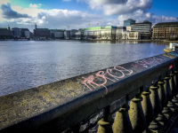 graffiti on the lombardsbrücke in hamburg in front and behind you see the alster and the jungfernstieg