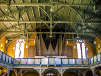 the vaulted ceiling, the organ and the church pews of the church Große Kreuzkirche in Hermannsburg in germany