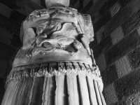 a big statue in the palace of the grandmaster of the knights of rhodes, black-and-white