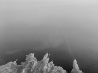 view from the airplane to the dodecanian island tilos and the aegean sea, black-and-white