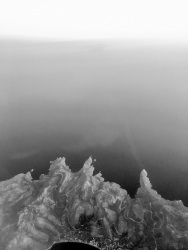 view from the airplane to the dodecanian island tilos and the aegean sea, black-and-white