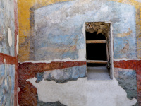 colorful walls in the archaeological site of pompeii near naples in italy