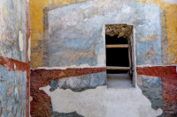 colorful walls in the archaeological site of pompeii near naples in italy