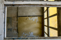 in eleousa on rhodes you see through a frame a yello ceiling with peeled paint