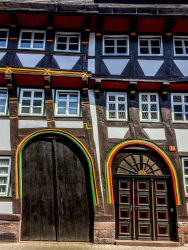 a half-timbered  house with two aslant doors and five windows in einbeck in germany