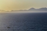 a view from monte smith on rhodes over the sea to the turkish coast in a loveley evening light