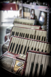 some accordions on the flea market in the avissinias square in monastiraki in athens
