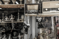antique cameras, radios and other objects presented in front of a shop in monastiraki in athens
