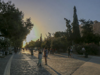 sunset at the promenade in makriyanni below the acropolis in athens