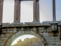 through the hadrian\'s arch you see a part of the acropolis in the backlight