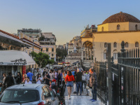 many people on the way next to the hadrian\'s library which leads to the monastiraki square