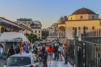 many people on the way next to the hadrian\'s library which leads to the monastiraki square