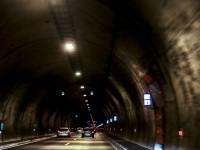 some cars in a tunnel on the highway 5 in greece near gavrolimni