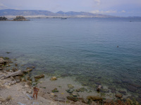a woman at the beach of piraeus near the olympiacos FC headquarter