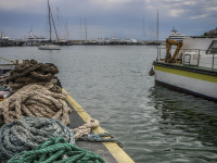 thick ropes at the harbor in piraeus behind the olypmiacos FC headquarter